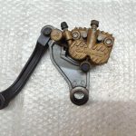 HONDA BALI 50- BRAKE CALIPER FRONT/ BRACKET