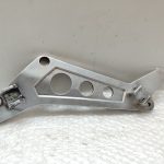 HONDA NTV 650 REVERE- FOOT PEG BRACKET LEFT